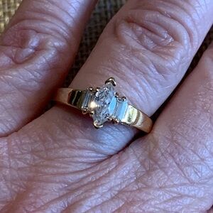 Marquis cut CZ with baguettes on the side. 7 3/4